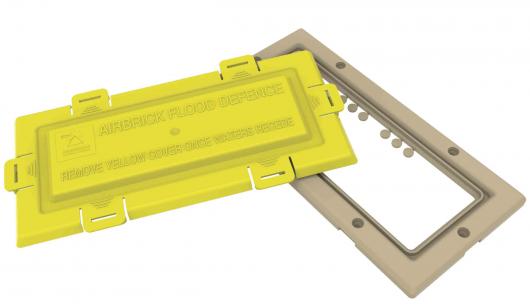 Polypropylene air brick flood defence with yellow push fit cover and buff frame