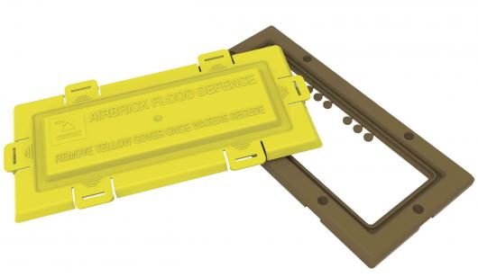 Polypropylene air brick flood defence with yellow push fit cover and brown frame
