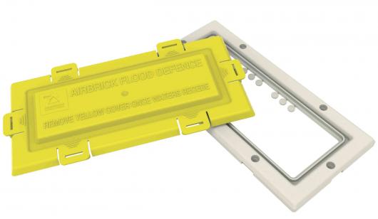 Polypropylene air brick flood defence with yellow push fit cover and white frame