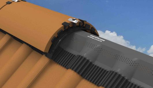 Black ridge roll with terracotta ridge tiles laid on top