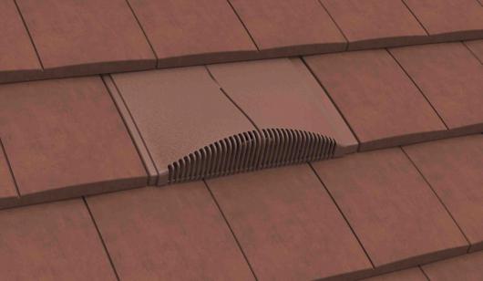 Antique Red interlocking plain tile vent installed on a tiled roof