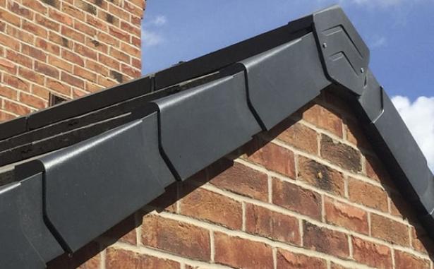 Right and left handed dry fix black verge units fitted to the verge of a roof